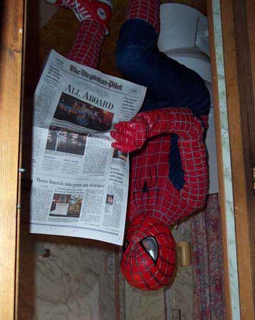 SpiderLex wipes from front to back.  And.  Likes his TP to roll over.  Not.  Under.